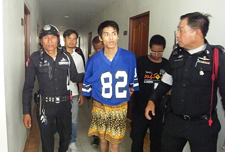 Police arrest Montri Padtha for illegal drug and weapons possession, plus pointing a gun at a police officer.